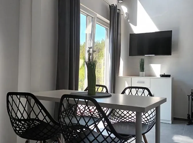 Nad Jeziorem W Borach Tucholskich Сasa de vacaciones Skorzenno